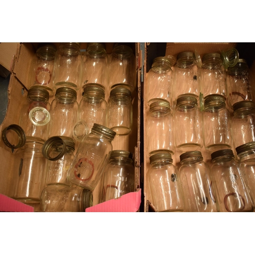 273 - A collection of Kilner jars, of varying sizes, with odd spare lids (Qty), collection only.