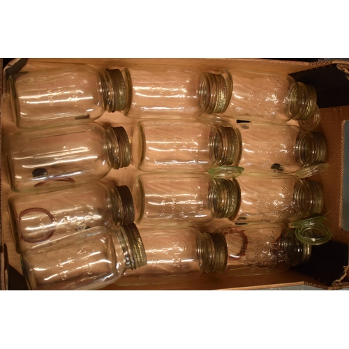 273 - A collection of Kilner jars, of varying sizes, with odd spare lids (Qty), collection only.