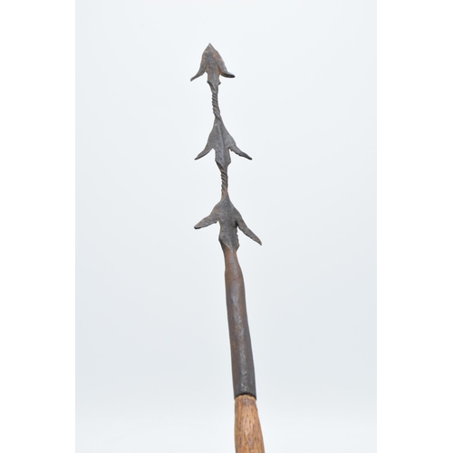 343 - 19th century wooden and barbed iron African fishing spear, 104cm long.