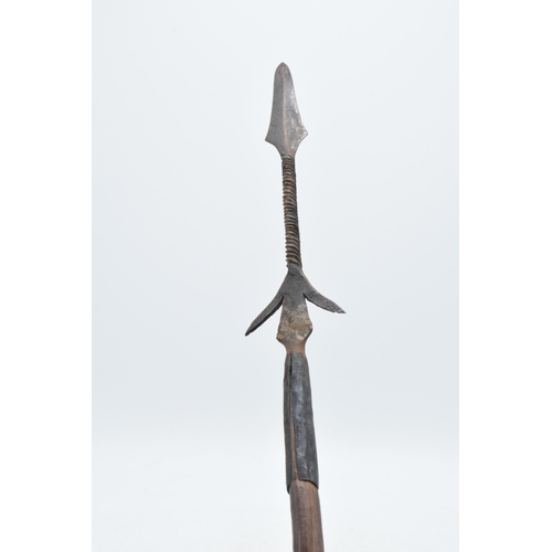 346 - 19th century wooden and barbed iron African fishing spear, 101cm long.