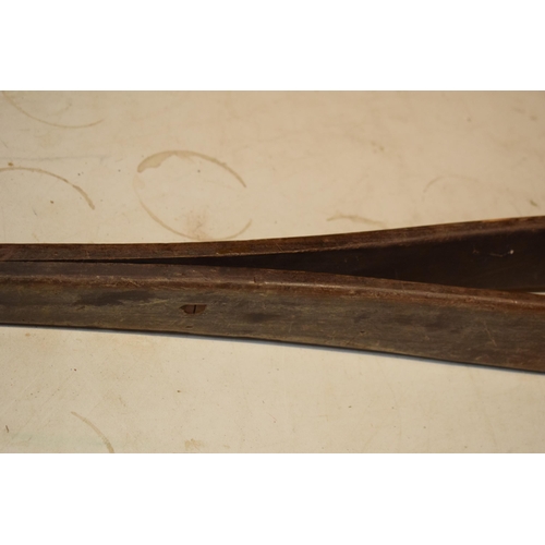 347 - Antique wooden leather saddle stitching tool, 76cm long.