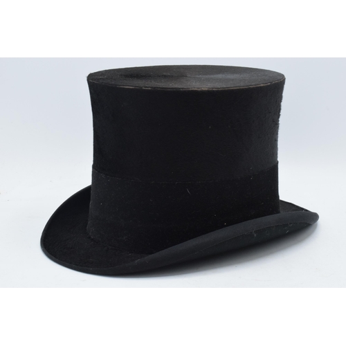 348 - A pair of black gentleman's top hats, one 'Best Quality London, opening 18x15cm, and the other Bayne... 