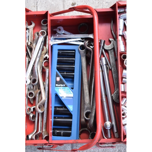 353 - A vintage red metal folding toolbox with contents to include sockets, spanners, wrenches, impact soc... 