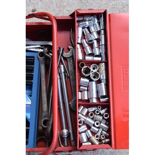 353 - A vintage red metal folding toolbox with contents to include sockets, spanners, wrenches, impact soc... 