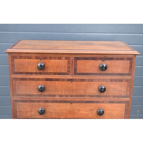 365 - 19th century oak 2 over 3 chest of drawers with ebonised handles, 110 x 54 x 108cm tall.