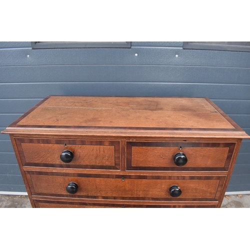 365 - 19th century oak 2 over 3 chest of drawers with ebonised handles, 110 x 54 x 108cm tall.