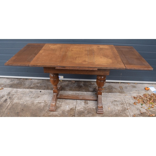 368 - 1930s wooden extending dining table with pull out leaves, 165 x 76 x 78 when extended, 105cm when cl... 