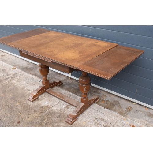 368 - 1930s wooden extending dining table with pull out leaves, 165 x 76 x 78 when extended, 105cm when cl... 