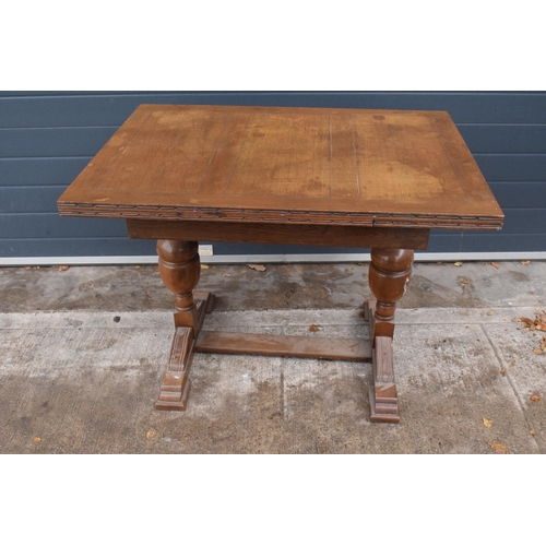 368 - 1930s wooden extending dining table with pull out leaves, 165 x 76 x 78 when extended, 105cm when cl... 