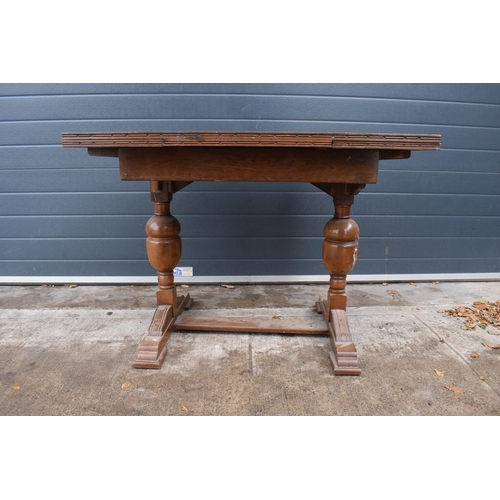 368 - 1930s wooden extending dining table with pull out leaves, 165 x 76 x 78 when extended, 105cm when cl... 