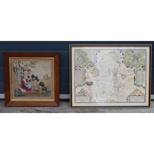 409 - A framed tapestry scene together with framed John Speed repro map of Stafford Countie and Towne, lar... 