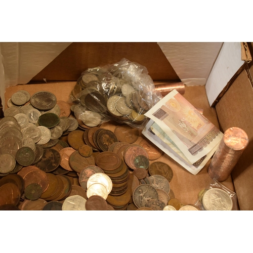 289A - A mixed collection of UK and foreign currency to include coins, bank notes, new coins in rolls and o... 