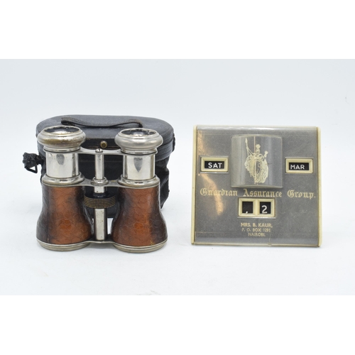 244B - Cased set of early 20th century French leather opera glasses together with Guardian Assurance Group ... 