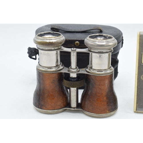 244B - Cased set of early 20th century French leather opera glasses together with Guardian Assurance Group ... 