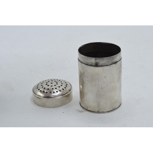 102 - Antique silver shaker, unmarked, circa 1740, with crest to centre, 43.5 grams, 6.5cm tall.