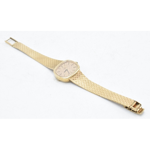 127 - Omega 9ct gold ladies wristwatch with 9ct gold bracelet with oval face, gross weight 30.2 grams, in ... 