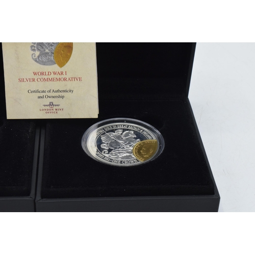 14 - Boxed The London Mint World War One Silver Commemorative One Crown Coin, each weighs 28.28 grams (2)... 