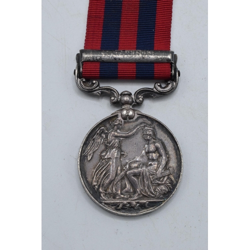 142 - Queen Victoria silver Hazara 1891 medal inscribed with native's name serving for British Army.