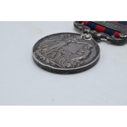 142 - Queen Victoria silver Hazara 1891 medal inscribed with native's name serving for British Army.