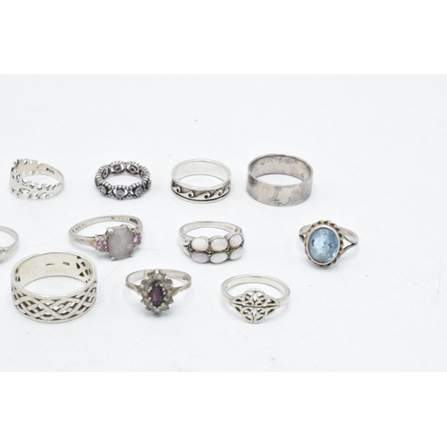 174 - A collection of 11 silver rings of varying forms and sizes, 42.2 grams (11).