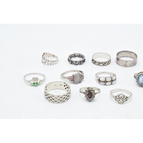 174 - A collection of 11 silver rings of varying forms and sizes, 42.2 grams (11).