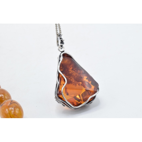 208 - A butterscotch amber (or similar) single-row necklace of graduating amber beads, approximately 37cm ... 