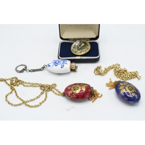 209 - A collection of jewellery and similar to include boxed Aynsley pottery brooch and eastern-style scen... 