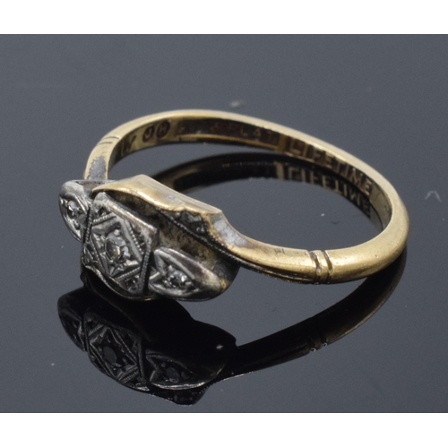 214 - 9ct gold and platinum ladies ring set with illusion-set diamonds. 1.8 grams. Size J/K.