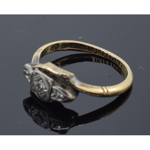 214 - 9ct gold and platinum ladies ring set with illusion-set diamonds. 1.8 grams. Size J/K.