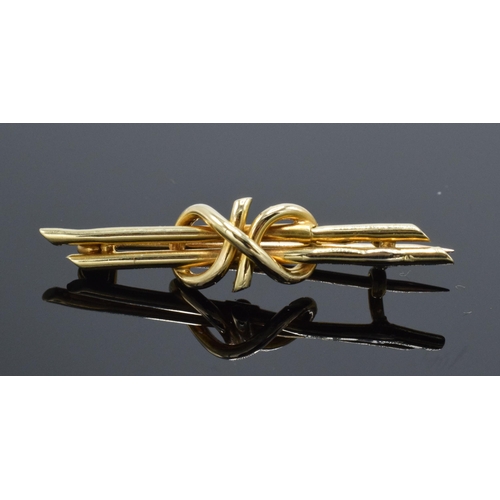 216 - 15ct gold knot bar brooch, 2.1 grams, 4cm wide.