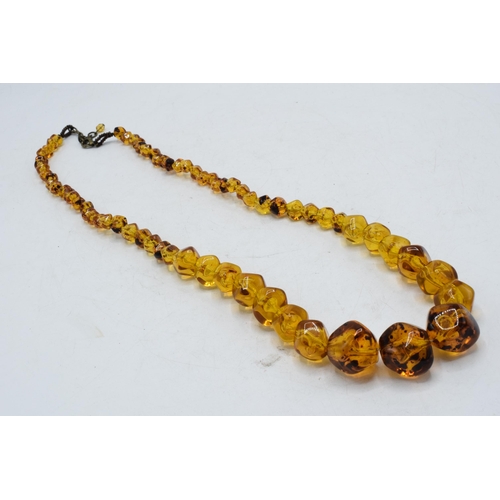 222 - Faux amber vintage necklace, 76cm long.