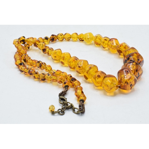 222 - Faux amber vintage necklace, 76cm long.