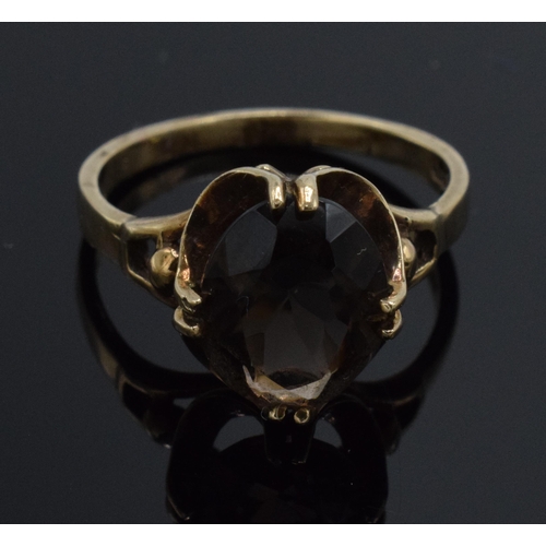 224 - 9ct gold ladies dress ring set with dark stone, 2.7 grams, size N.