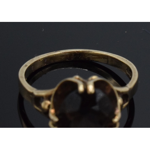 224 - 9ct gold ladies dress ring set with dark stone, 2.7 grams, size N.