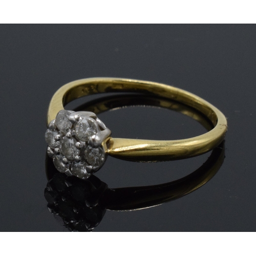 226 - 18ct gold diamond daisy ring, 2.6 grams, size N.