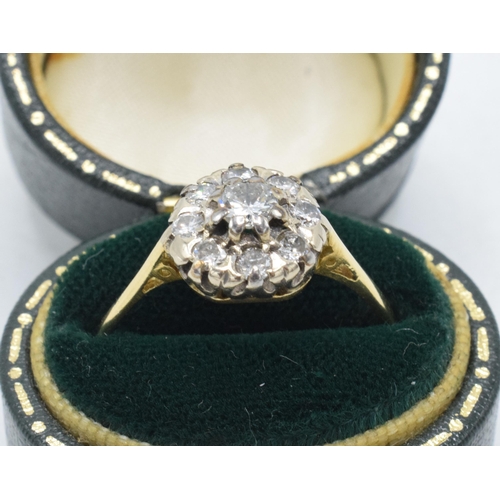 234 - 18ct gold and platinum daisy ring set with diamonds, approximately 0.5 carat of diamonds, UK size T,... 