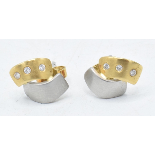 236 - A quality pair of 18ct gold, platinum and diamond earrings, 3.1 grams.