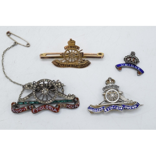 244 - 9ct gold Artillery brooch, 2.5 grams, together with 3 similar silver examples (4).