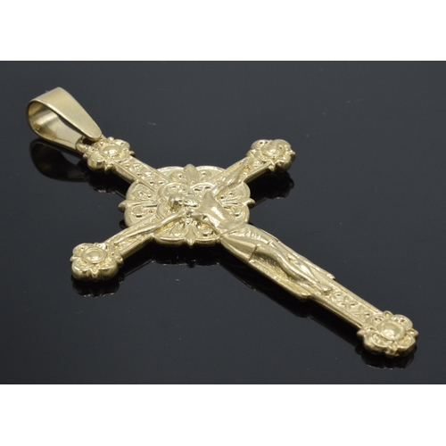 249 - 9ct gold ornate heavy crucifix pendant, 23.1 grams, 9cm tall.