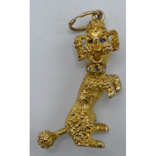 250 - 9ct gold heavy charm in the form of a poodle with stone-set eyes and collar, 11.1 grams, fully hallm... 