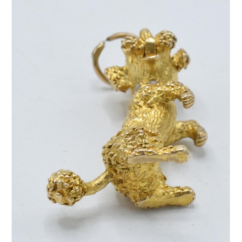 250 - 9ct gold heavy charm in the form of a poodle with stone-set eyes and collar, 11.1 grams, fully hallm... 