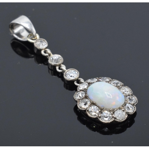 254 - Platinum and diamond pendant set with colourful white opal and diamonds, 9ct bail attached, 3.5cm lo... 