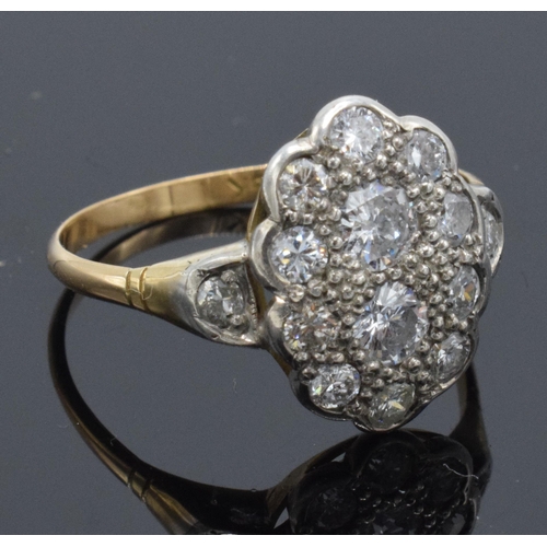 255 - 18ct gold cluster ring set with marquise shape diamonds, approximately 1.3ct. Size U/V. 3.3 grams.