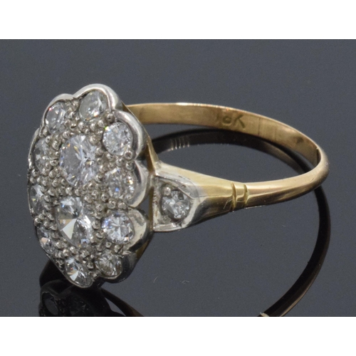 255 - 18ct gold cluster ring set with marquise shape diamonds, approximately 1.3ct. Size U/V. 3.3 grams.