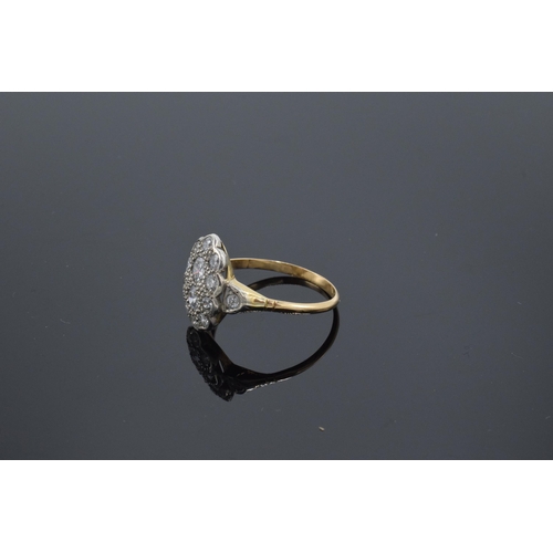 255 - 18ct gold cluster ring set with marquise shape diamonds, approximately 1.3ct. Size U/V. 3.3 grams.