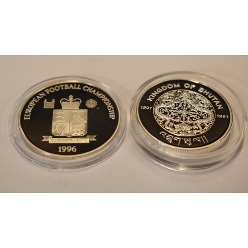 34 - A pair of sterling silver proof-like coins to include Bobby Charlton 1996 and The Queen Mother 50 Ng... 