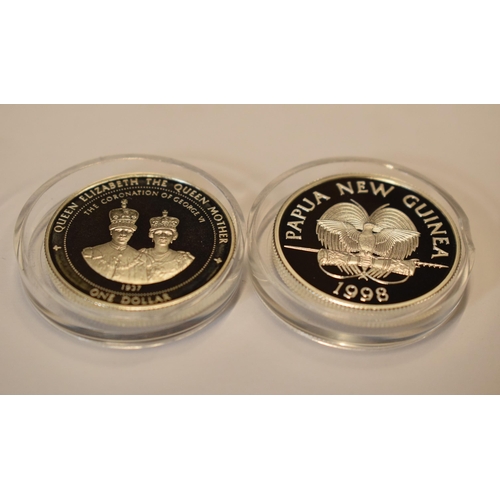 38 - A pair of sterling silver proof-like coins to include Papua New Guinea 2 Kina and Bermuda One Dollar... 