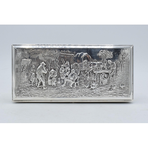 60 - Dutch silver plated cigarette box with repoussé decoration of a tavern scene. 18 x 8cm.