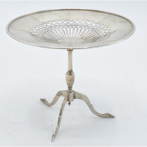 64 - Hallmarked silver ornate bon bon dish / stand in the form of a tripod table with pierced decoration,... 