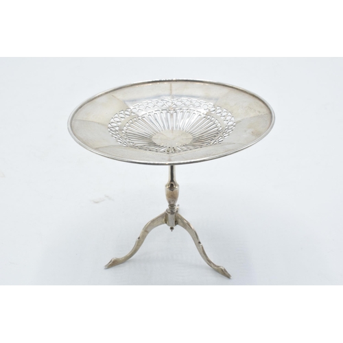 64 - Hallmarked silver ornate bon bon dish / stand in the form of a tripod table with pierced decoration,... 